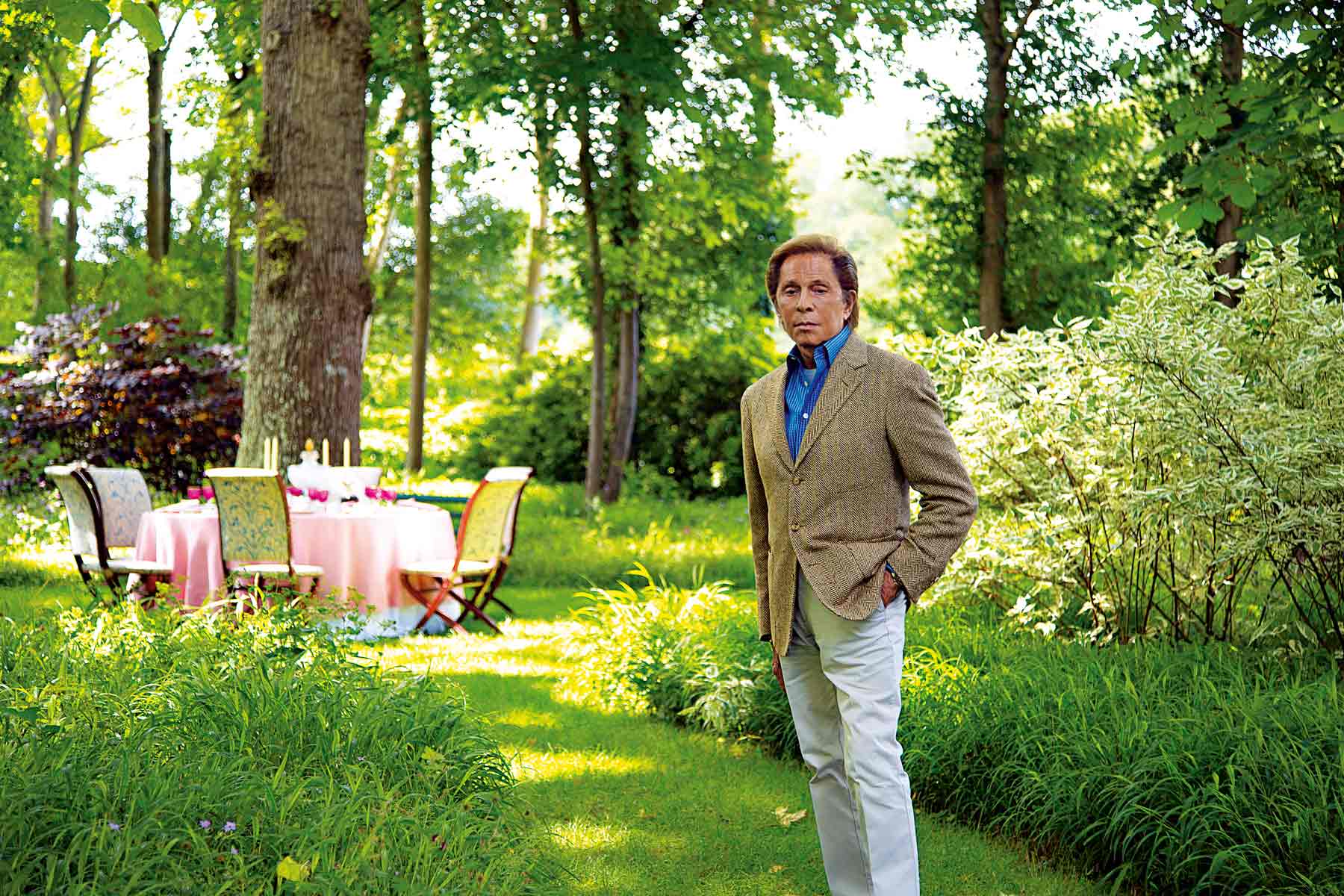 Wideville, Valentino invites his guests to his gracious table set for afternoon tea in the garden