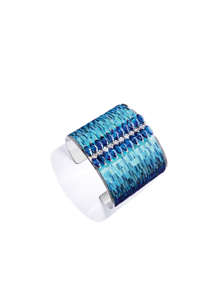 18K white gold cuff bracelet with marquise-cut sapphires, princess-cut diamonds and triangle-cut diamonds