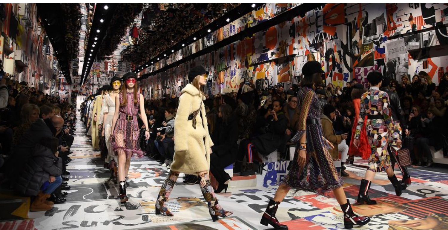 Dior Staged A 1960s Protest Down Its Fall 2018 Runway