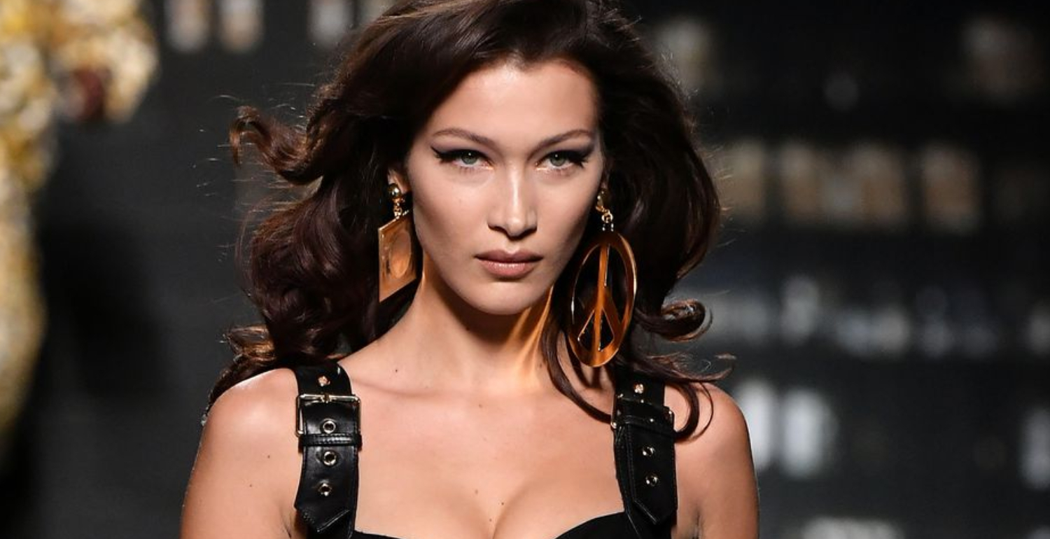 Bella Hadid Poses in Underwear, Knee-High Snakeskin Boots, & Nothing Else