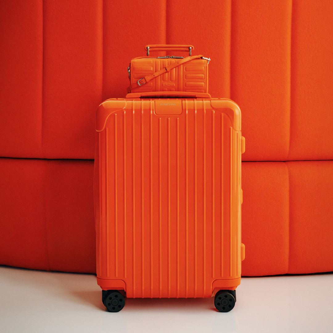 RIMOWA steps into the spotlight with new orange and magenta colourways that encapsulate the essence of summer. 