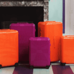 RIMOWA steps into the spotlight with new orange and magenta colourways that encapsulate the essence of summer. 